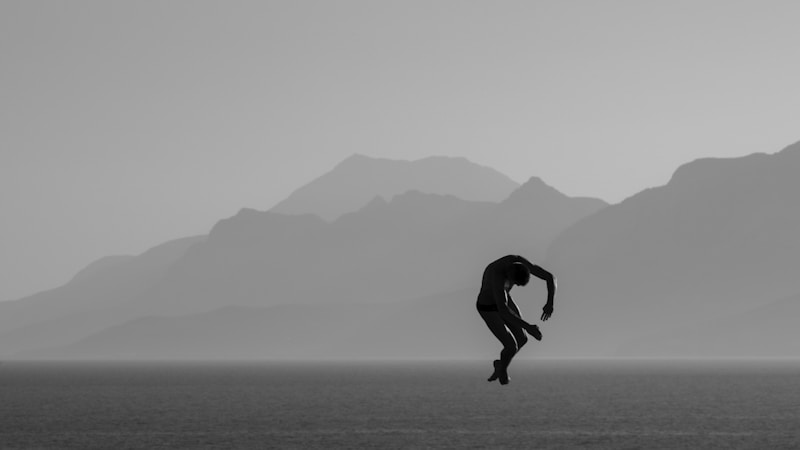 graceful dancer silhouette in mountain scenery