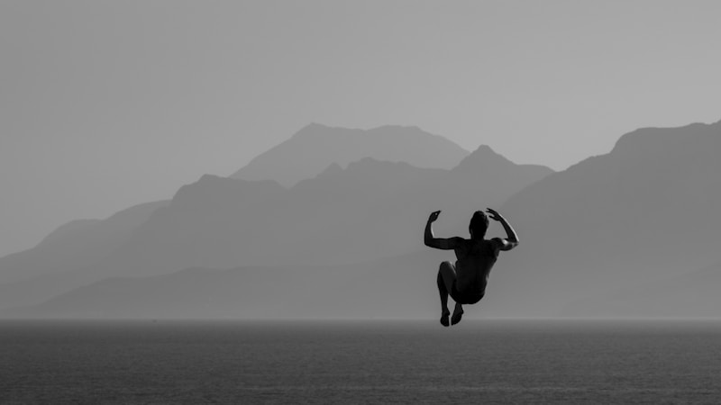 dynamic silhouette against mountain landscape