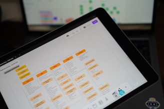 Tablet screen displaying a grid of orange blocks.