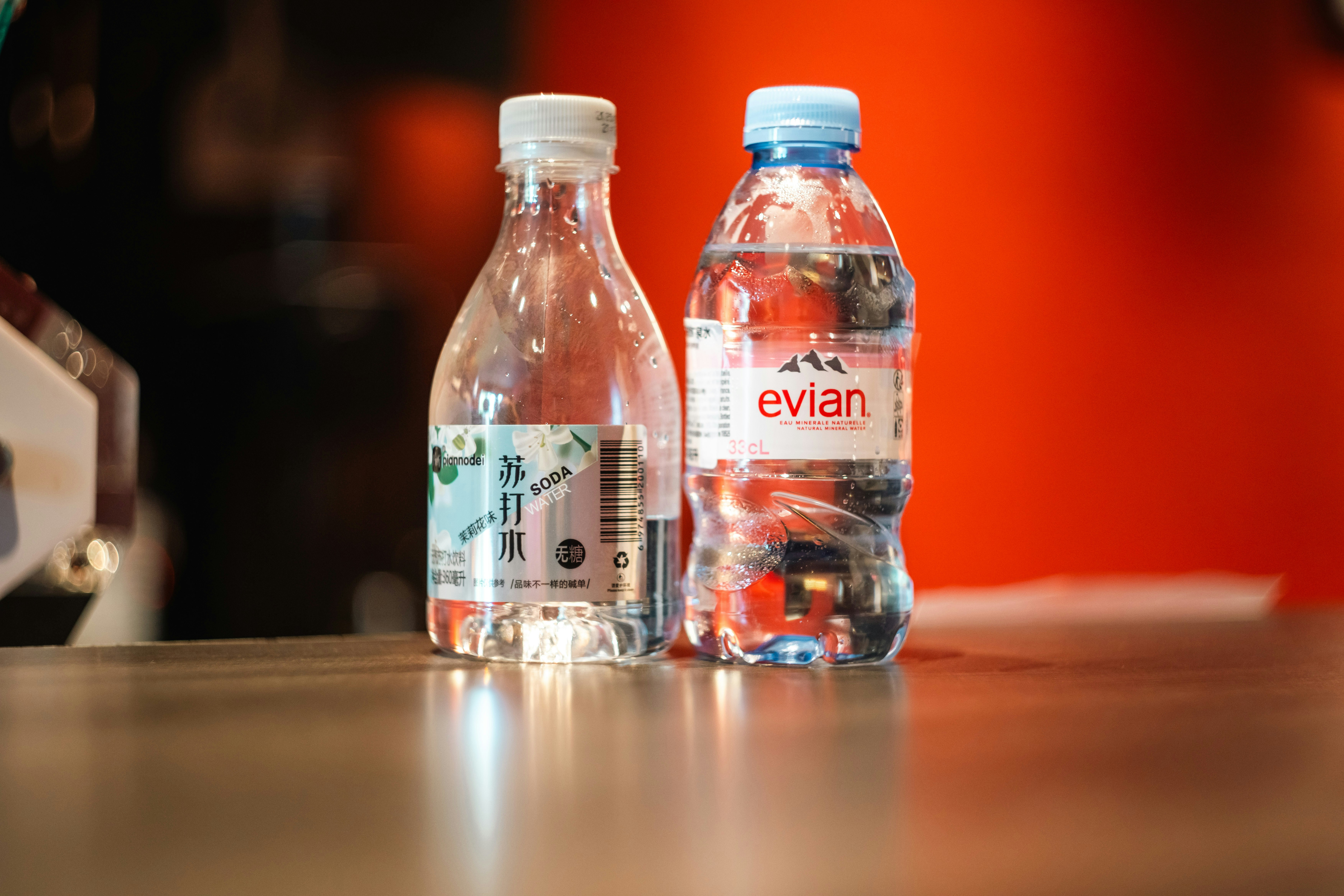 Two bottles of water on a table