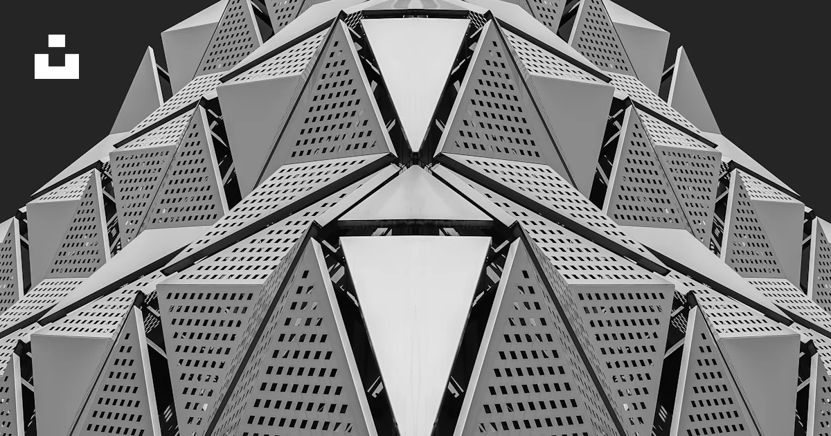 Geometric architectural structure with repeating triangular patterns ...