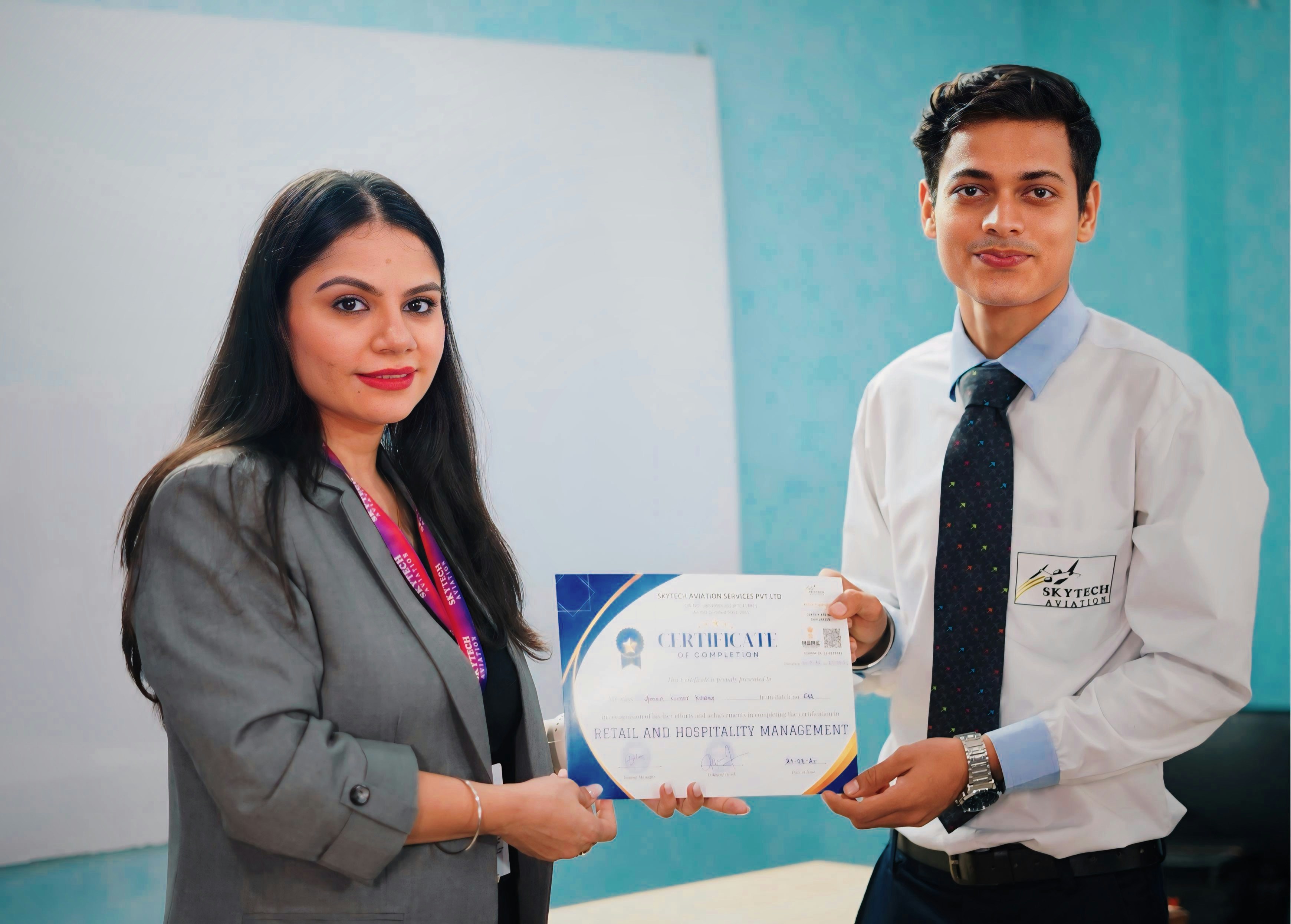 Woman presents certificate to man in office