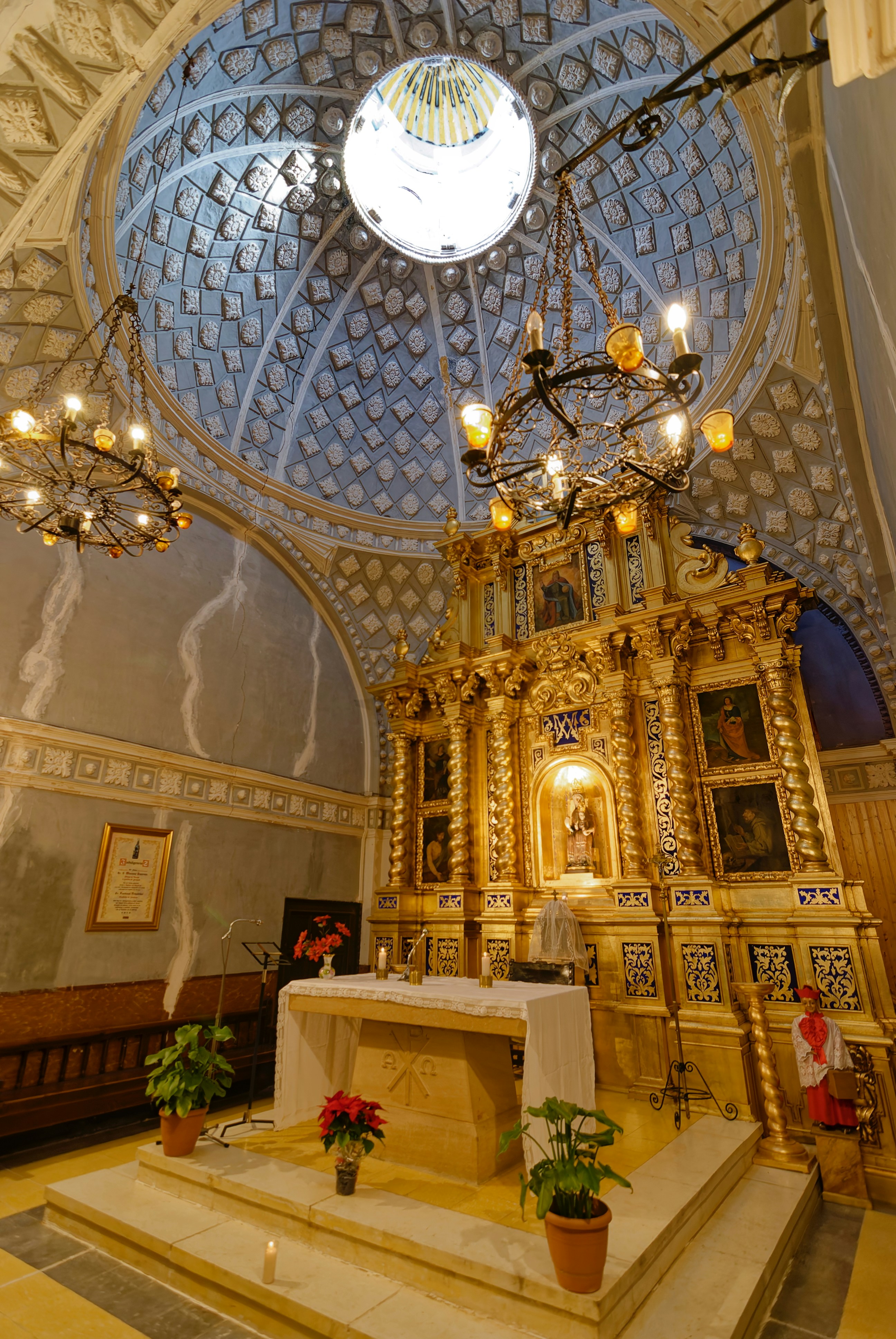 Ornate altar and dome inside a historic church