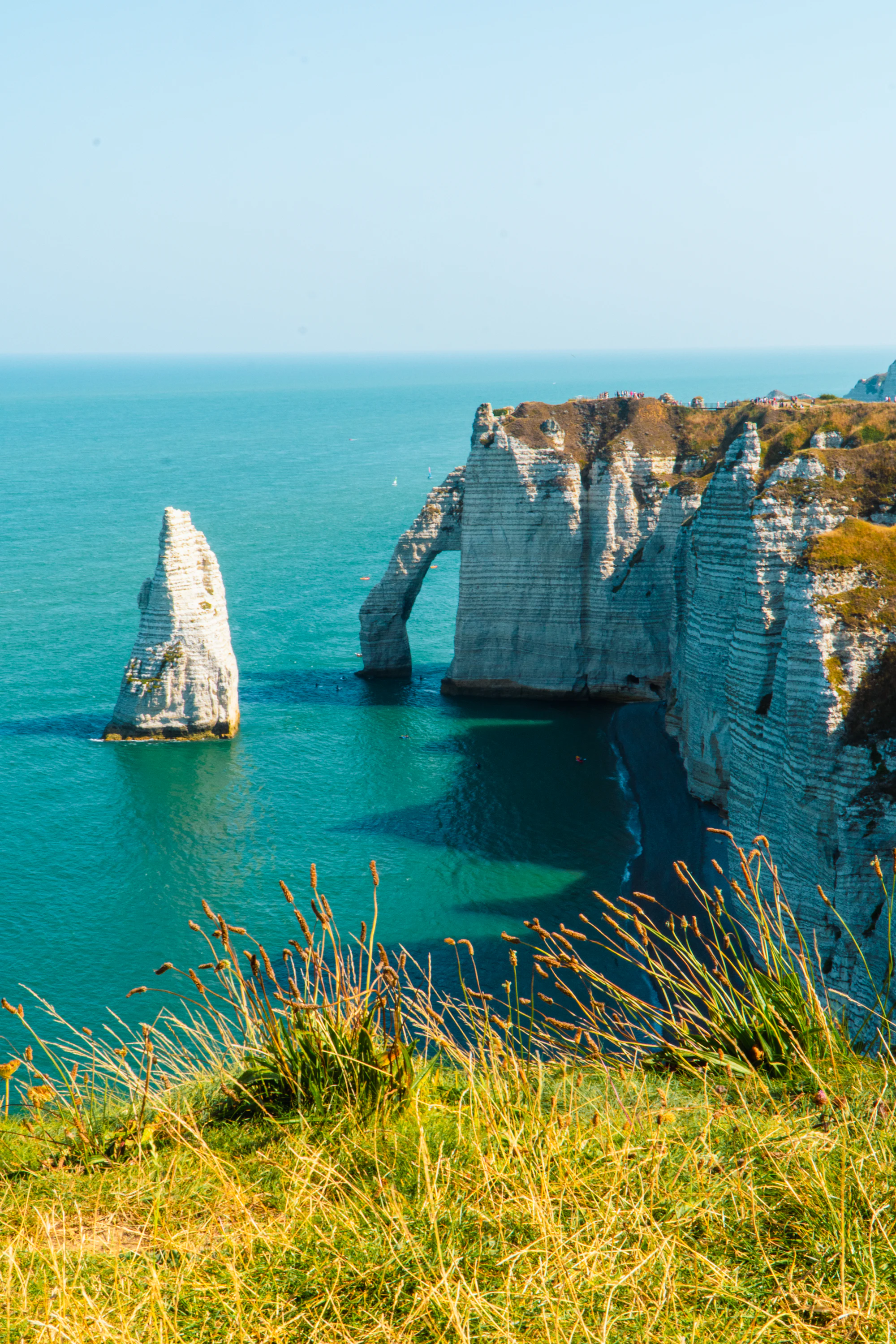 The white chalk cliffs and natural arch of Étretat, Normandy