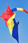 Skydiver with a large romanian flag parachute