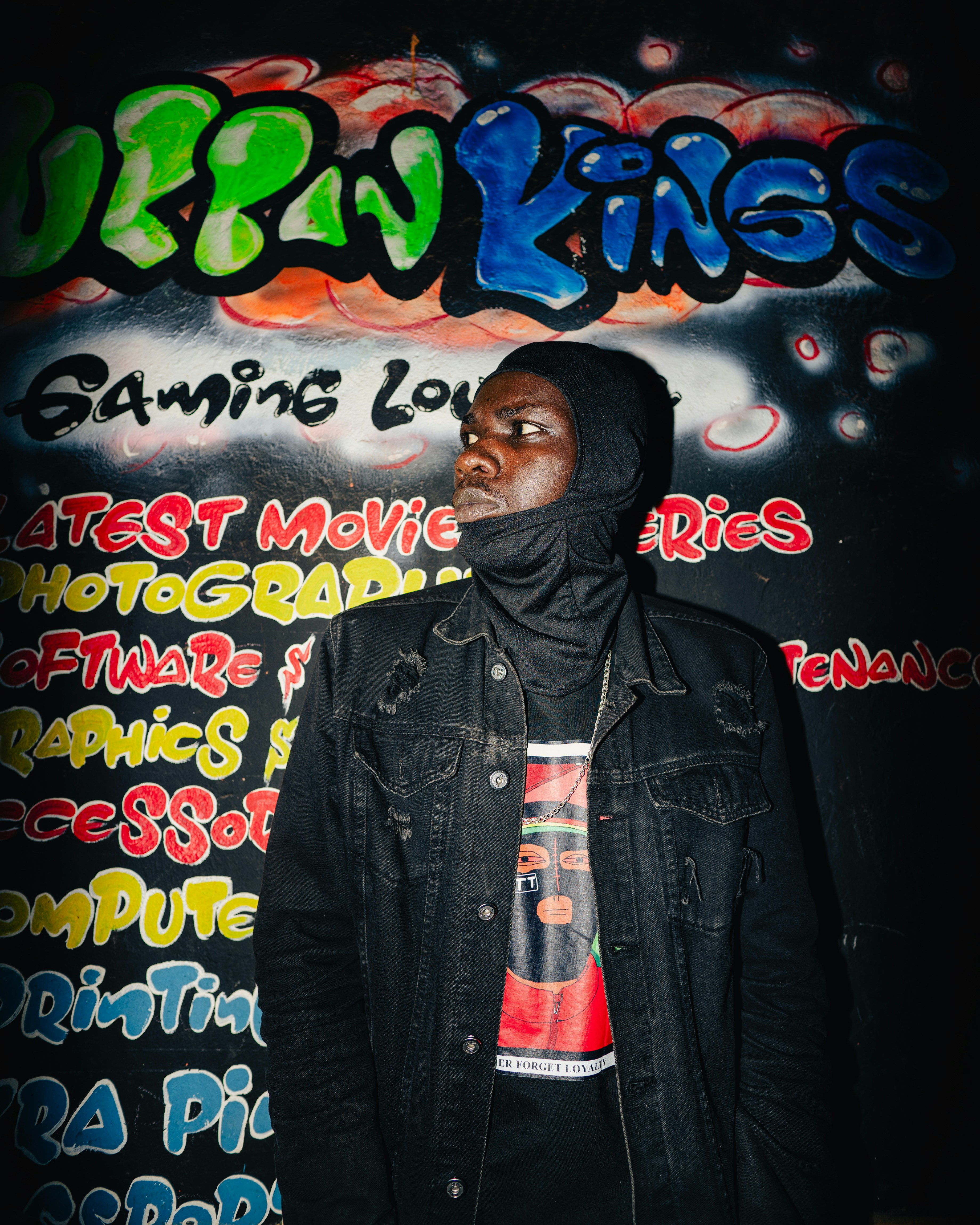 Young man in denim jacket and balaclava