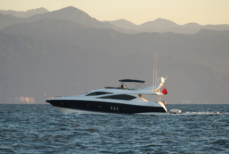 Yacht underway at dusk