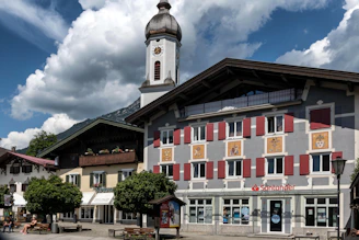 Traditional european buildings with a church steeple.