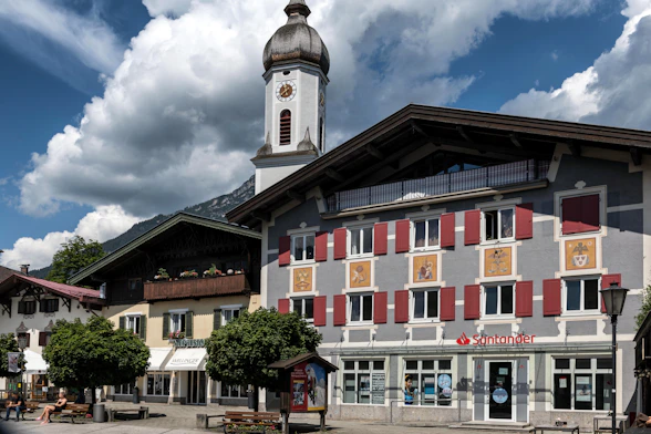 Traditional european buildings with a church steeple.