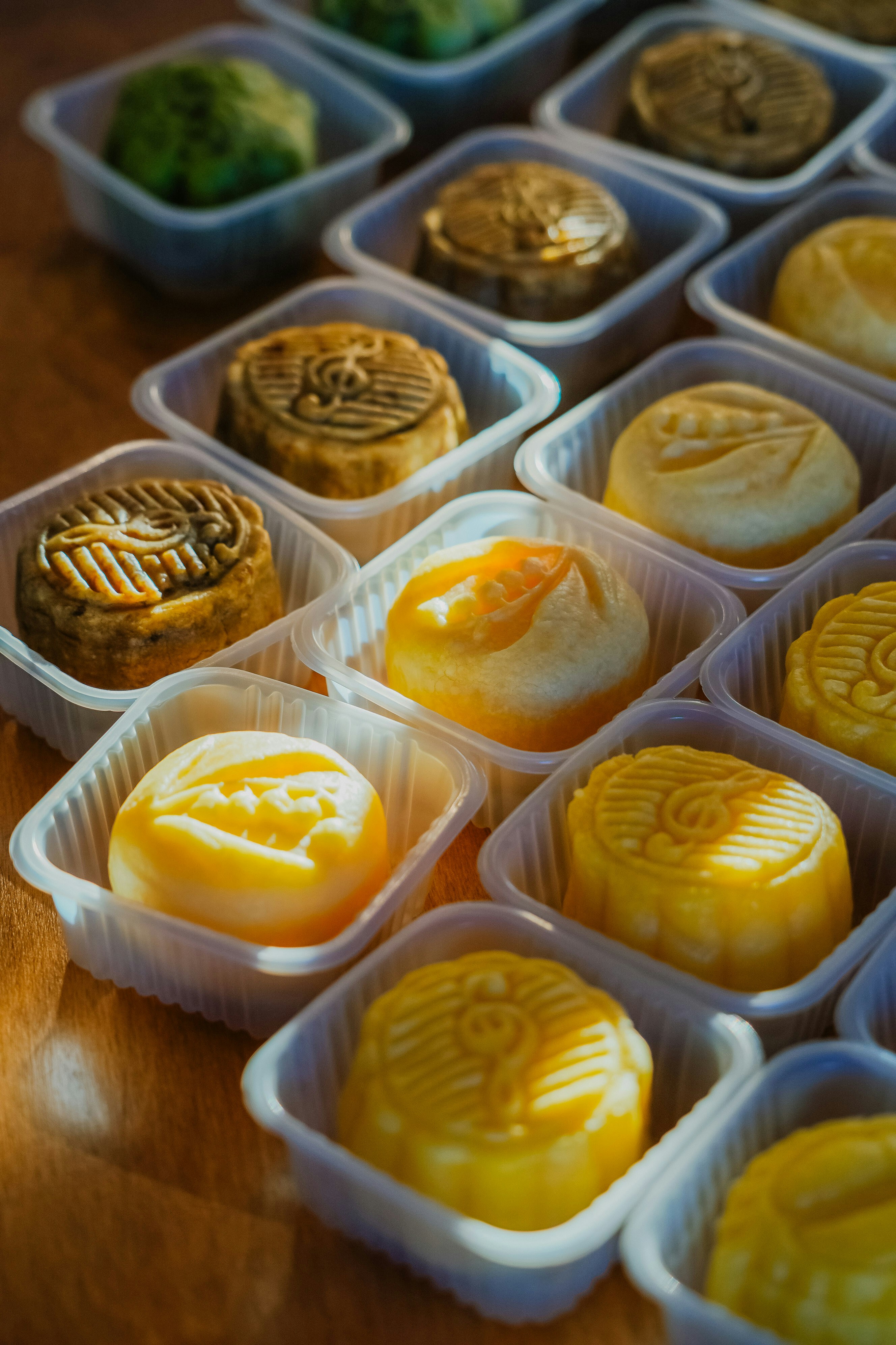 Many mooncakes arranged in plastic containers photo – Free Image on ...