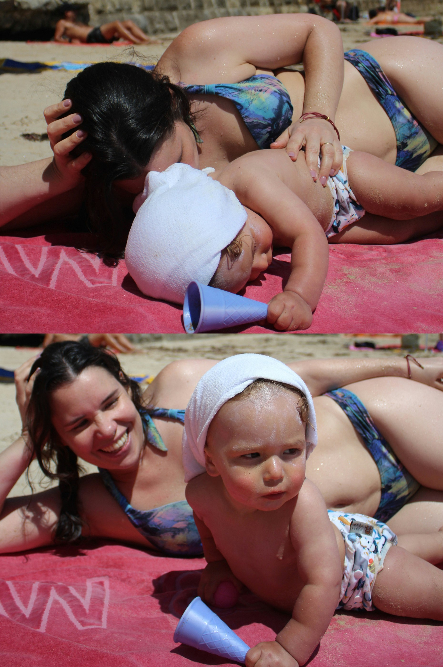 Ibu dan bayi bersantai di handuk pantai
