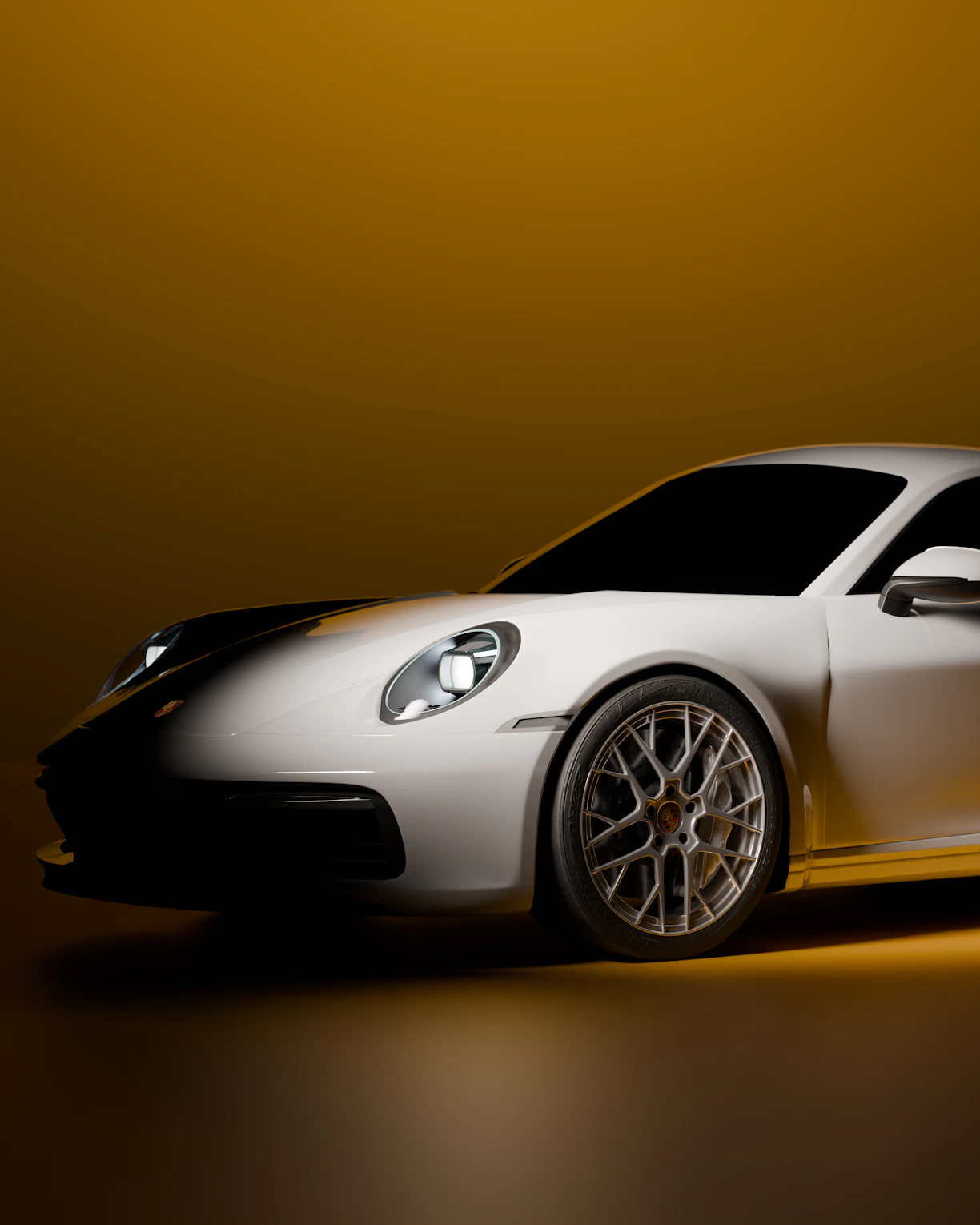 A white sports car with detailed rims.