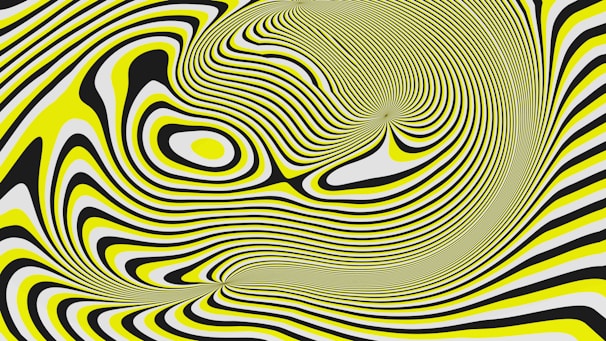 Abstract swirling pattern of yellow, black, and white lines.
