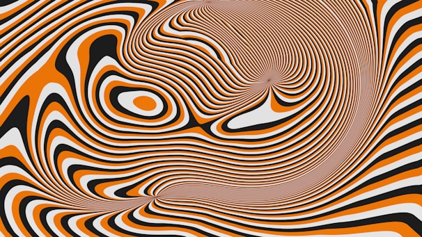 Abstract swirling pattern of orange, black, and white lines.