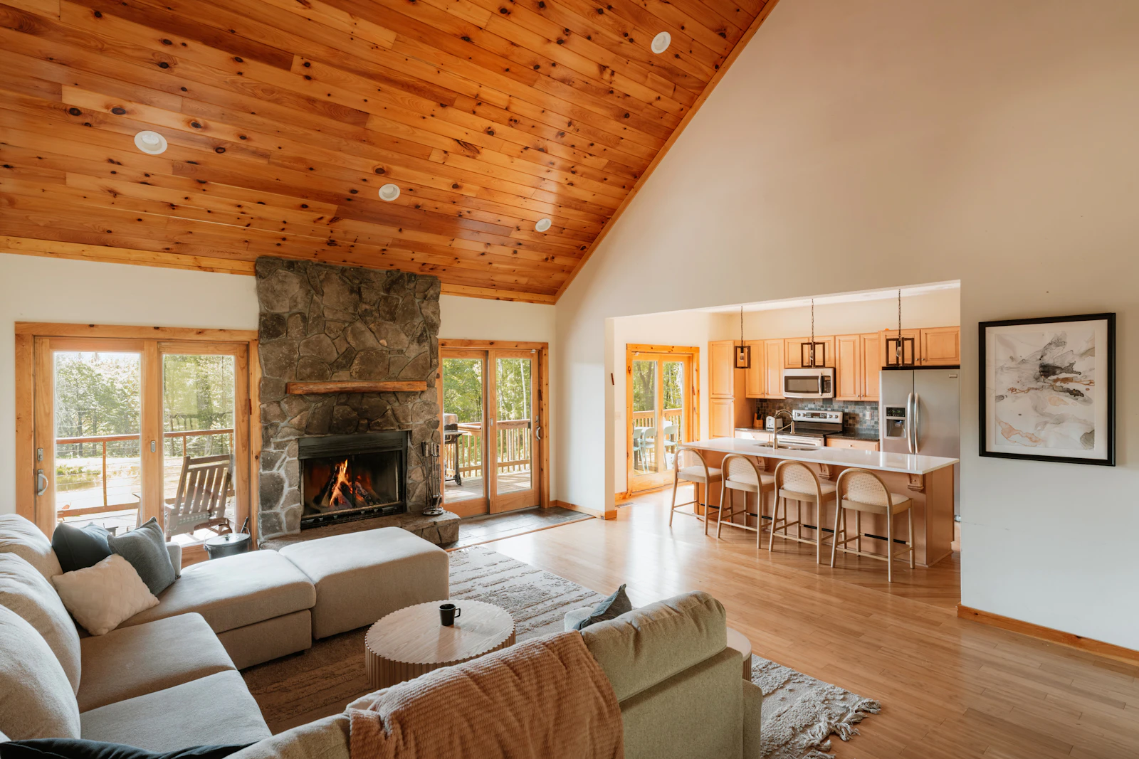 Living room with a full-height stone feature wall