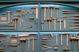Collection of various brass woodworking tools displayed neatly.