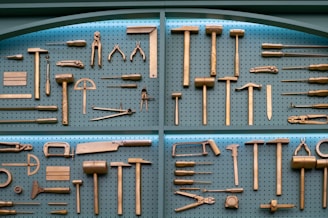 Collection of various brass woodworking tools displayed neatly.