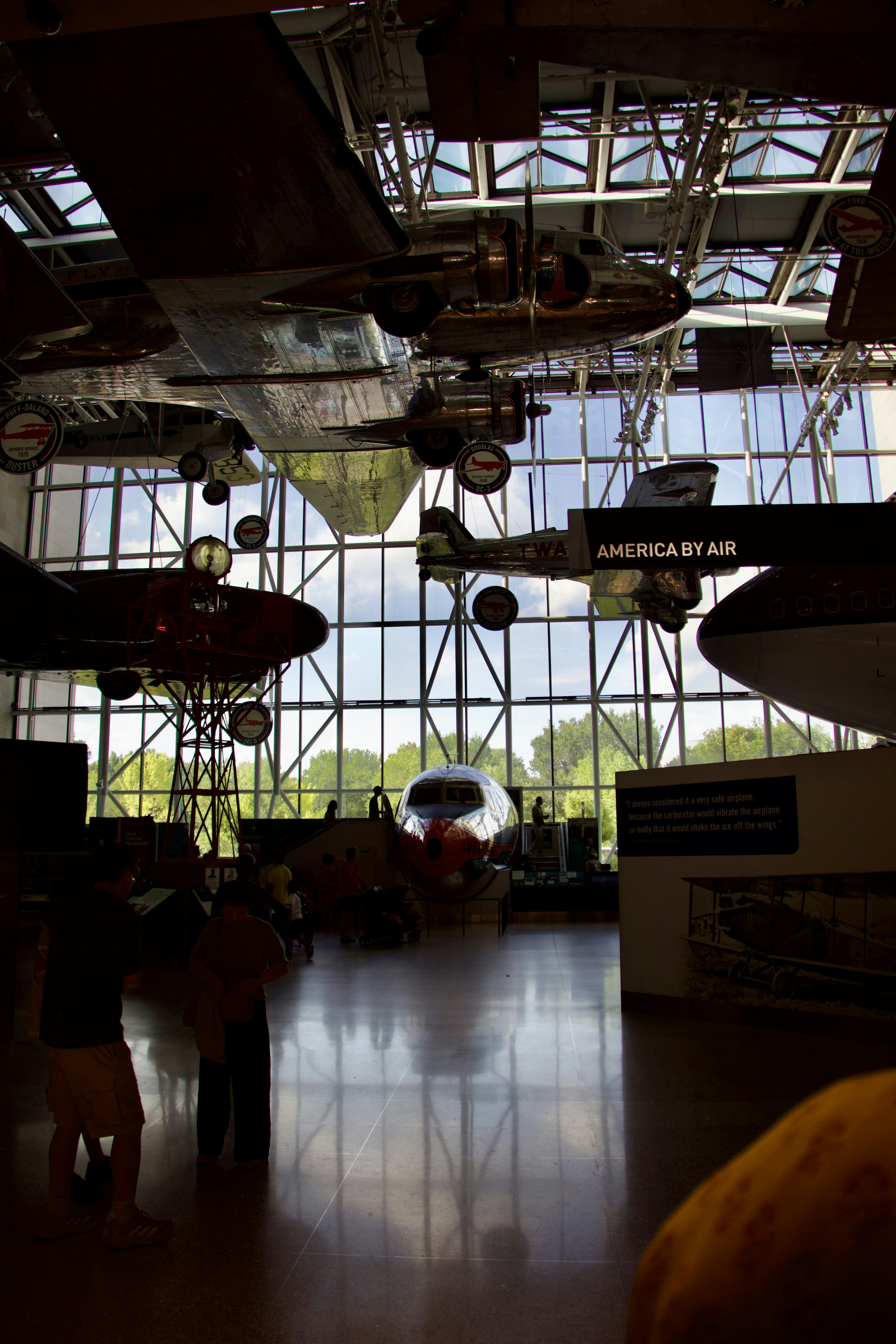 Airplanes suspended inside a large museum hall
