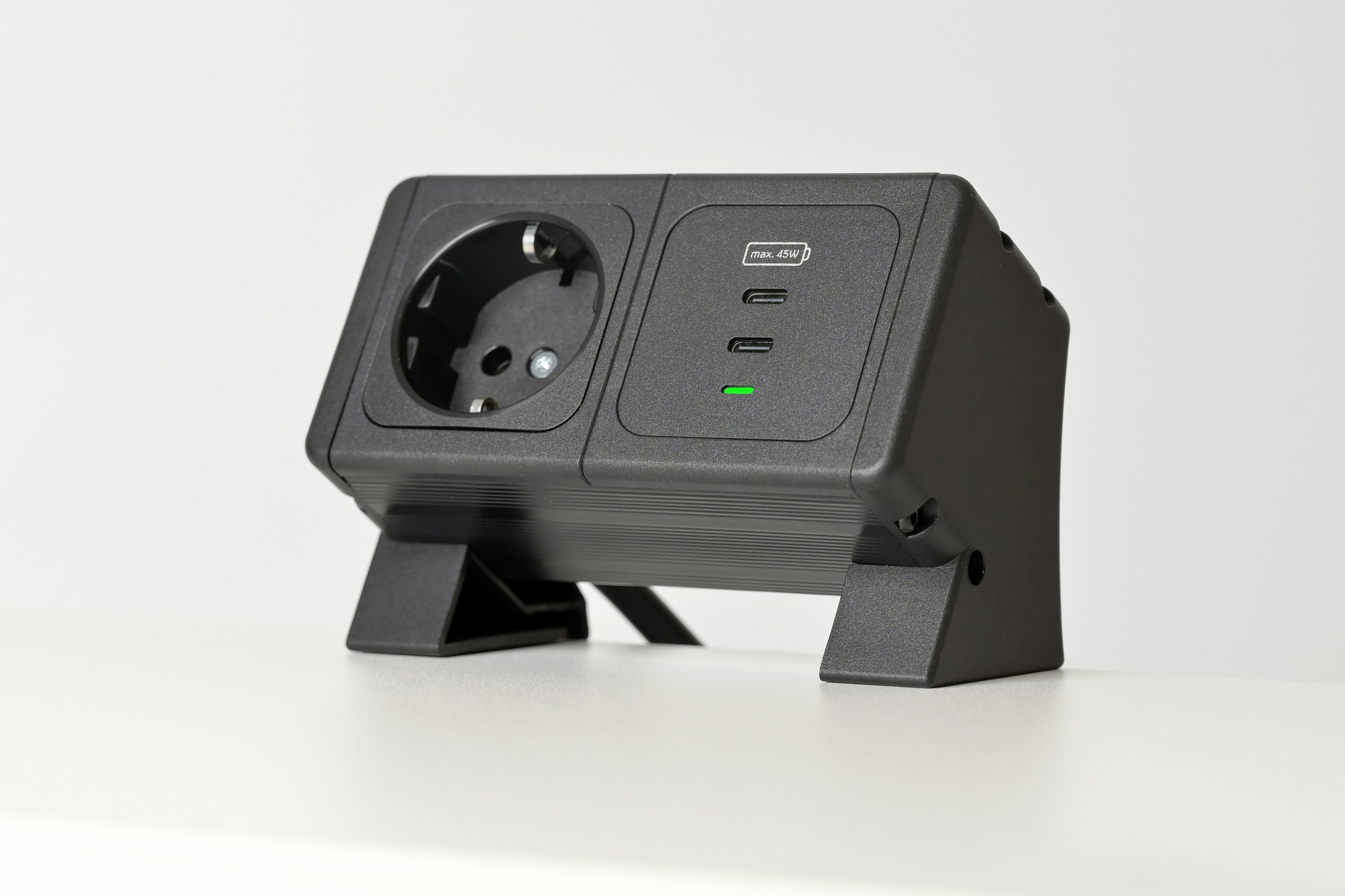 Black electrical adapter with two outlets and usb ports