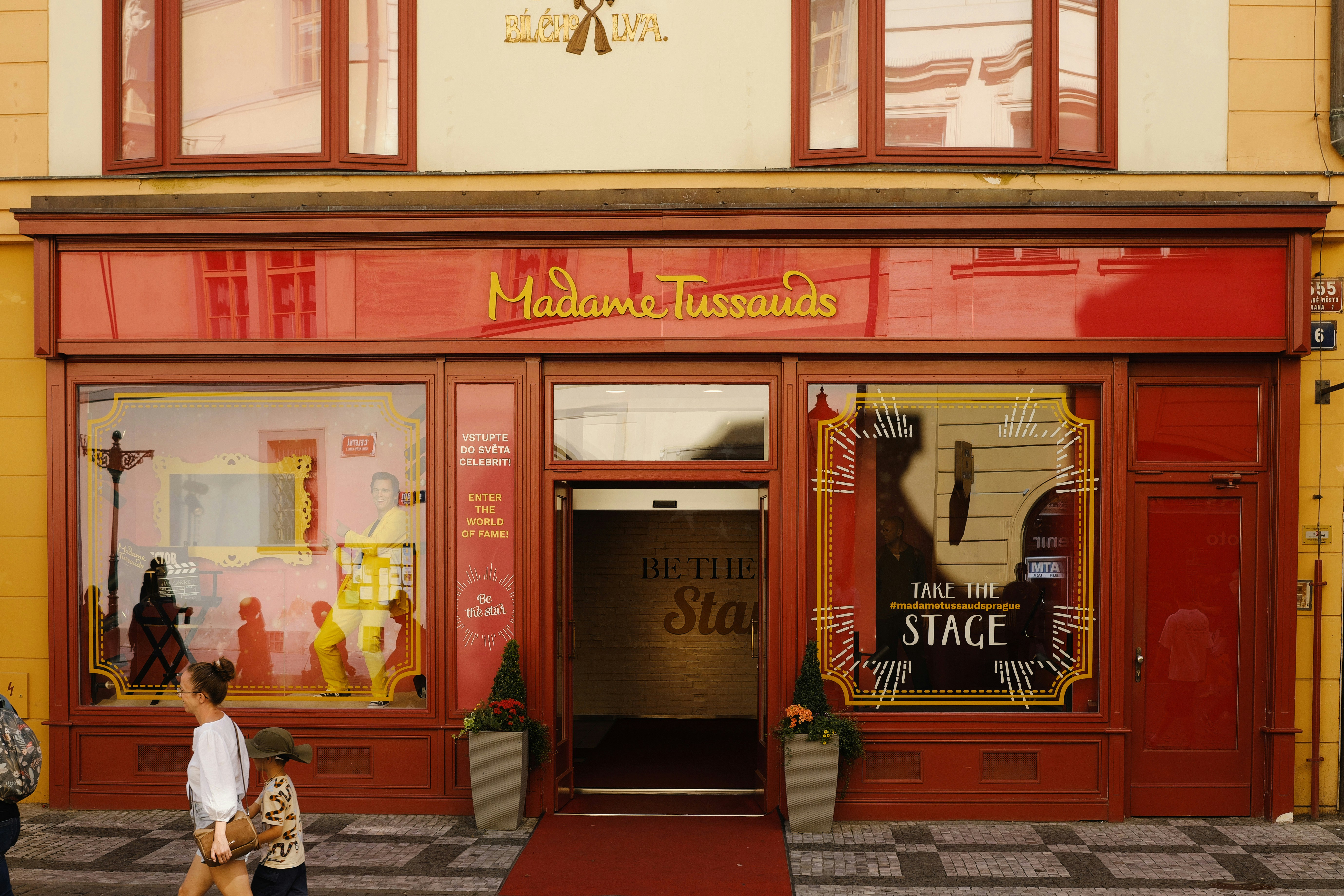 Madame tussauds wax museum storefront with red facade