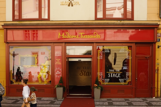 Madame tussauds wax museum storefront with red facade