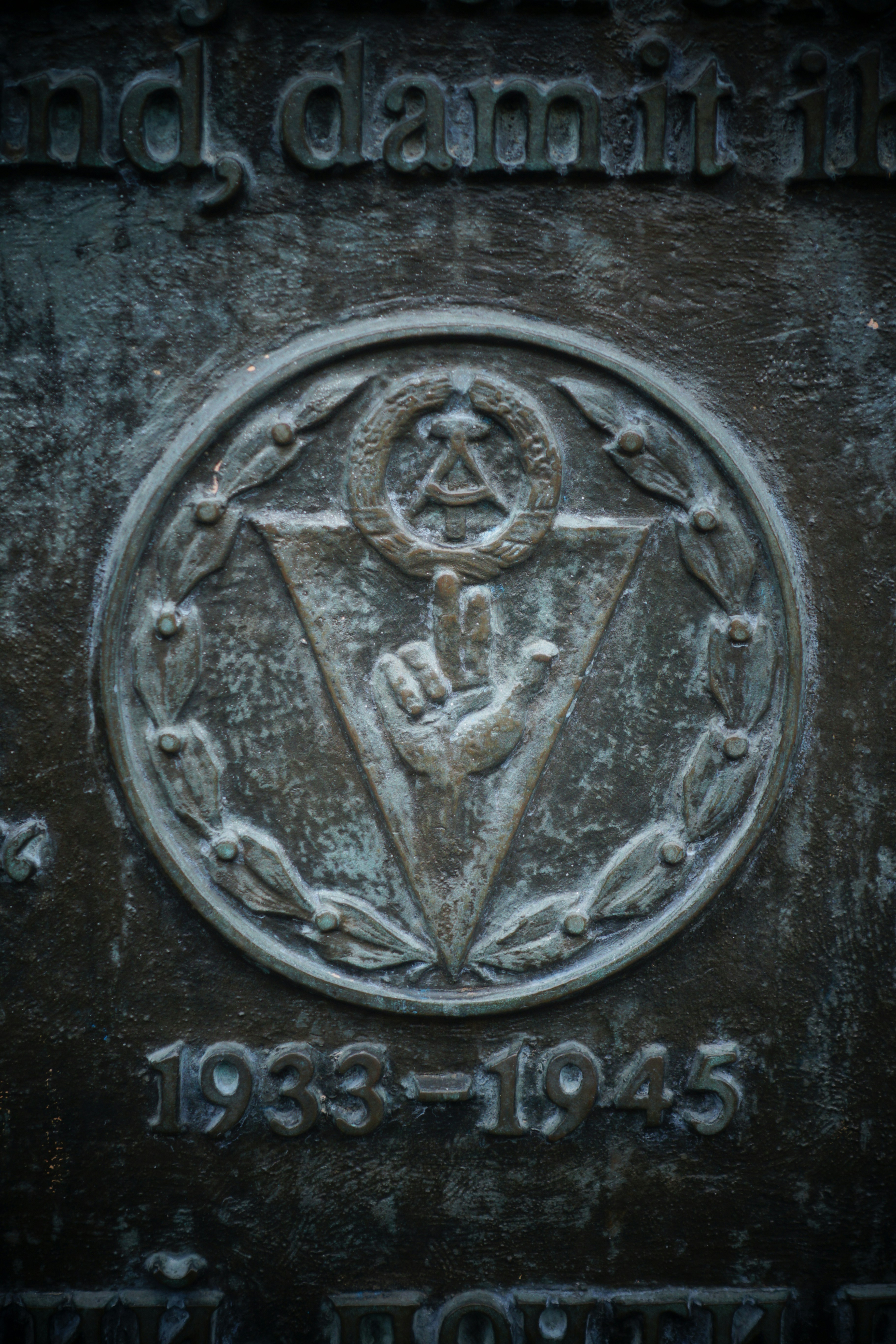 Bronze emblem with dates 1939-1945