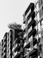 Modern apartment buildings with balconies and shutters