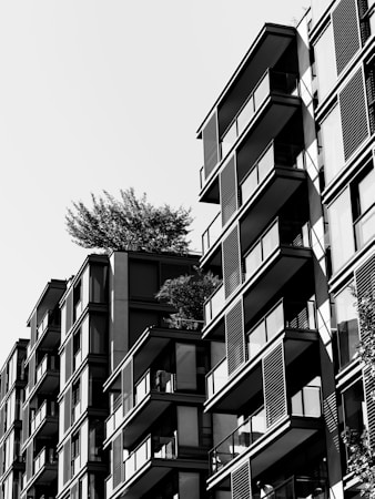 Modern multi-story condominium building with rows of balconies, representing the attached-home segment that slowed in Las Vegas
