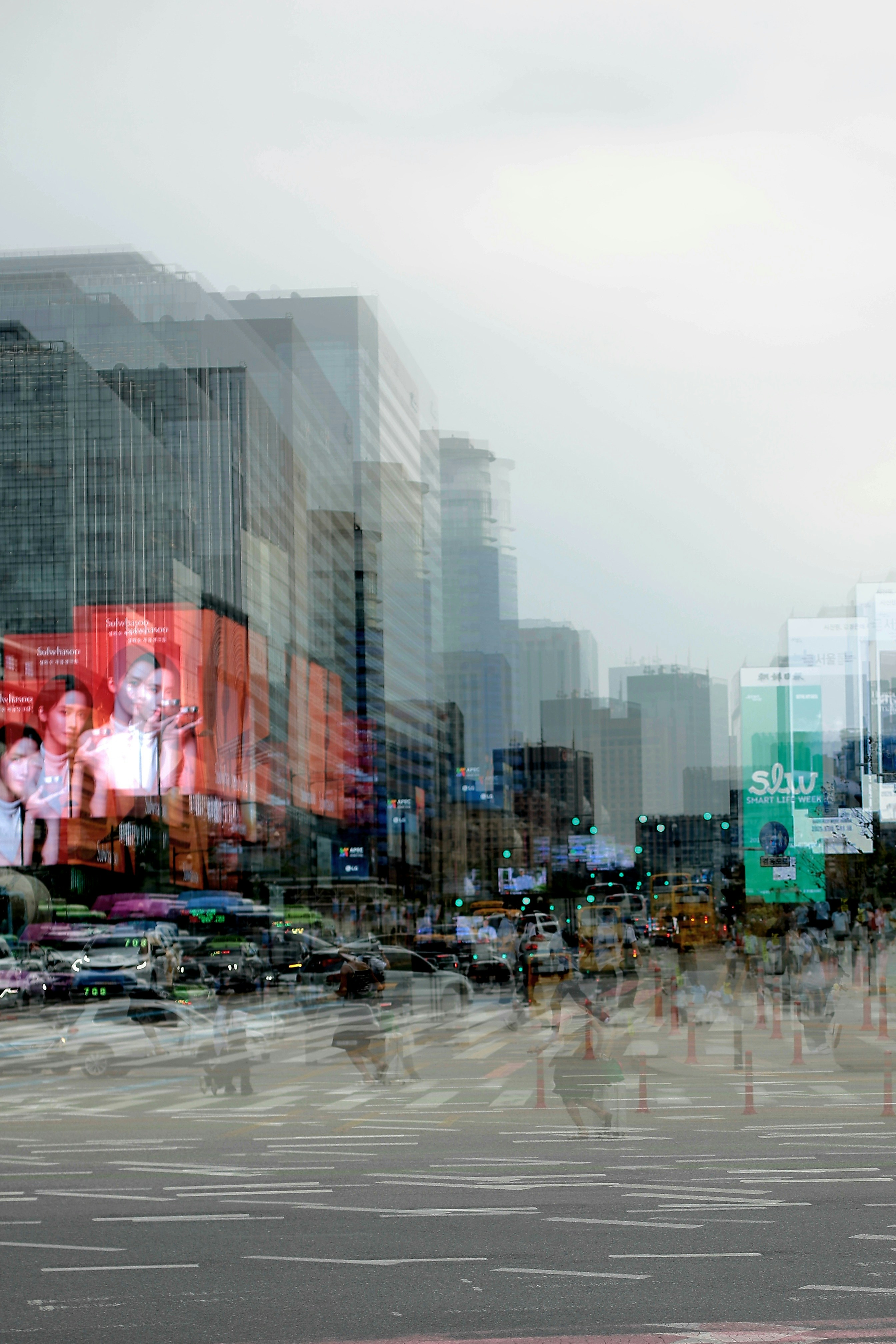 Blurred city street with buildings and traffic