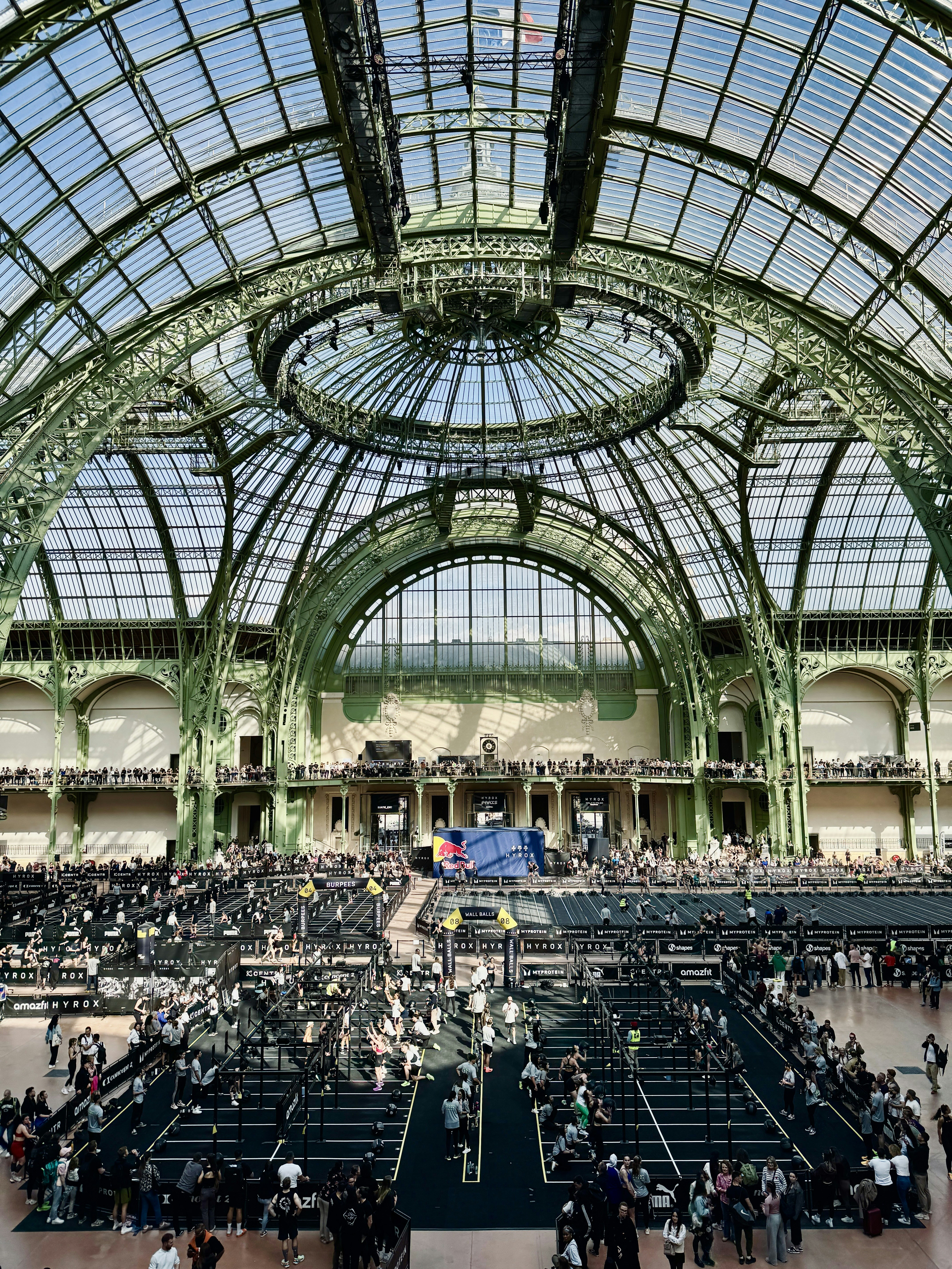 Grand interior of a large building with glass dome
