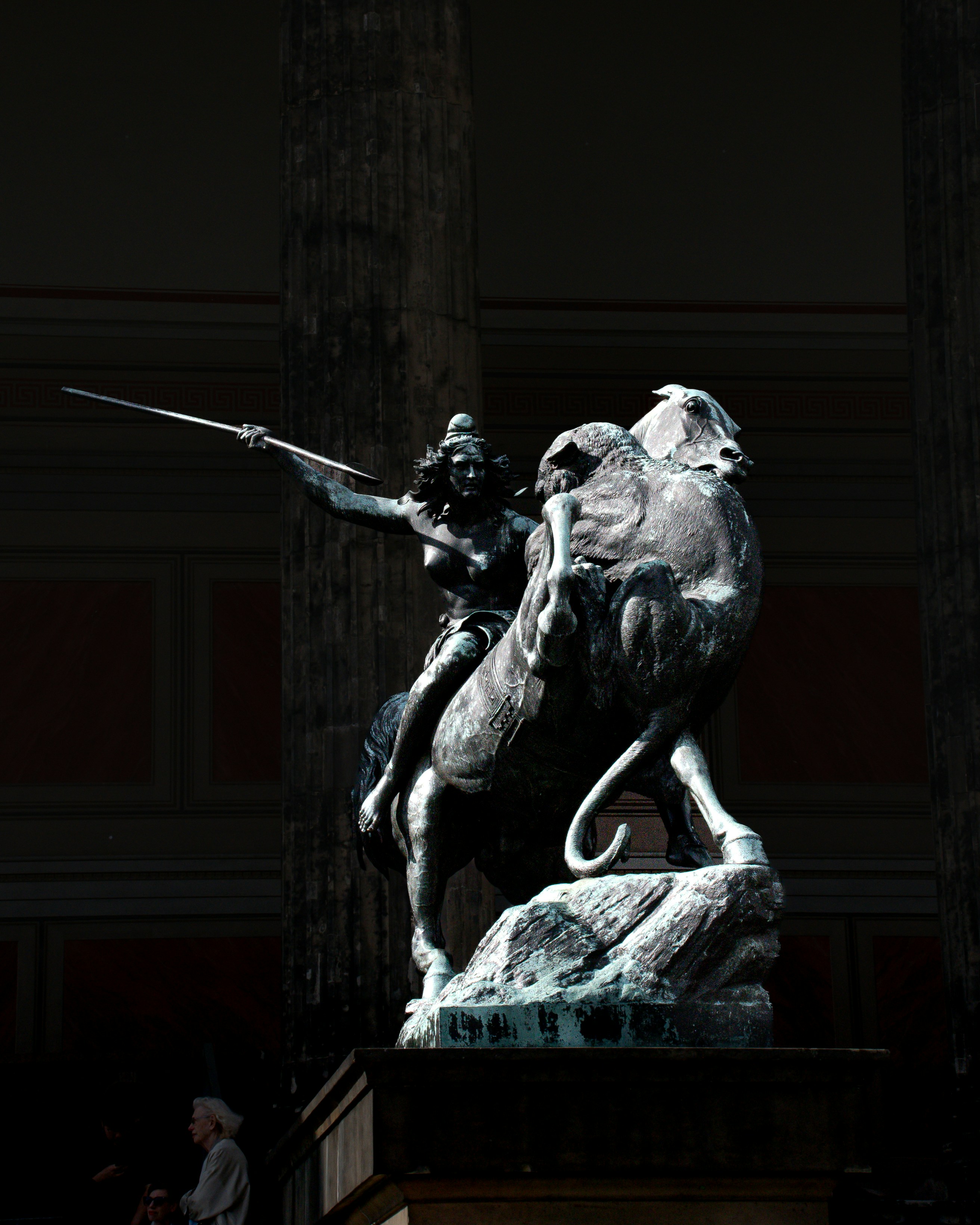 Bronze statue of a warrior riding a lion