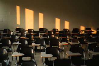 Empty classroom with sunlight casting shadows