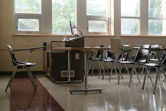 Empty classroom with desks and chairs