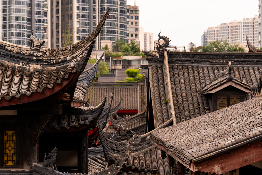 Traditional rooftops against modern towers in Chengdu's Taikoo Li