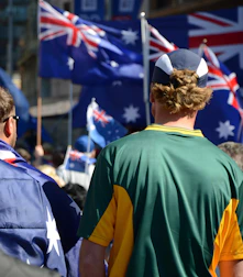 Crowd with australian flags waving