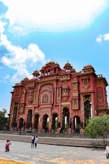 Ornate pink palace entrance with intricate architectural details