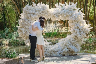 Couple embracing during a marriage proposal