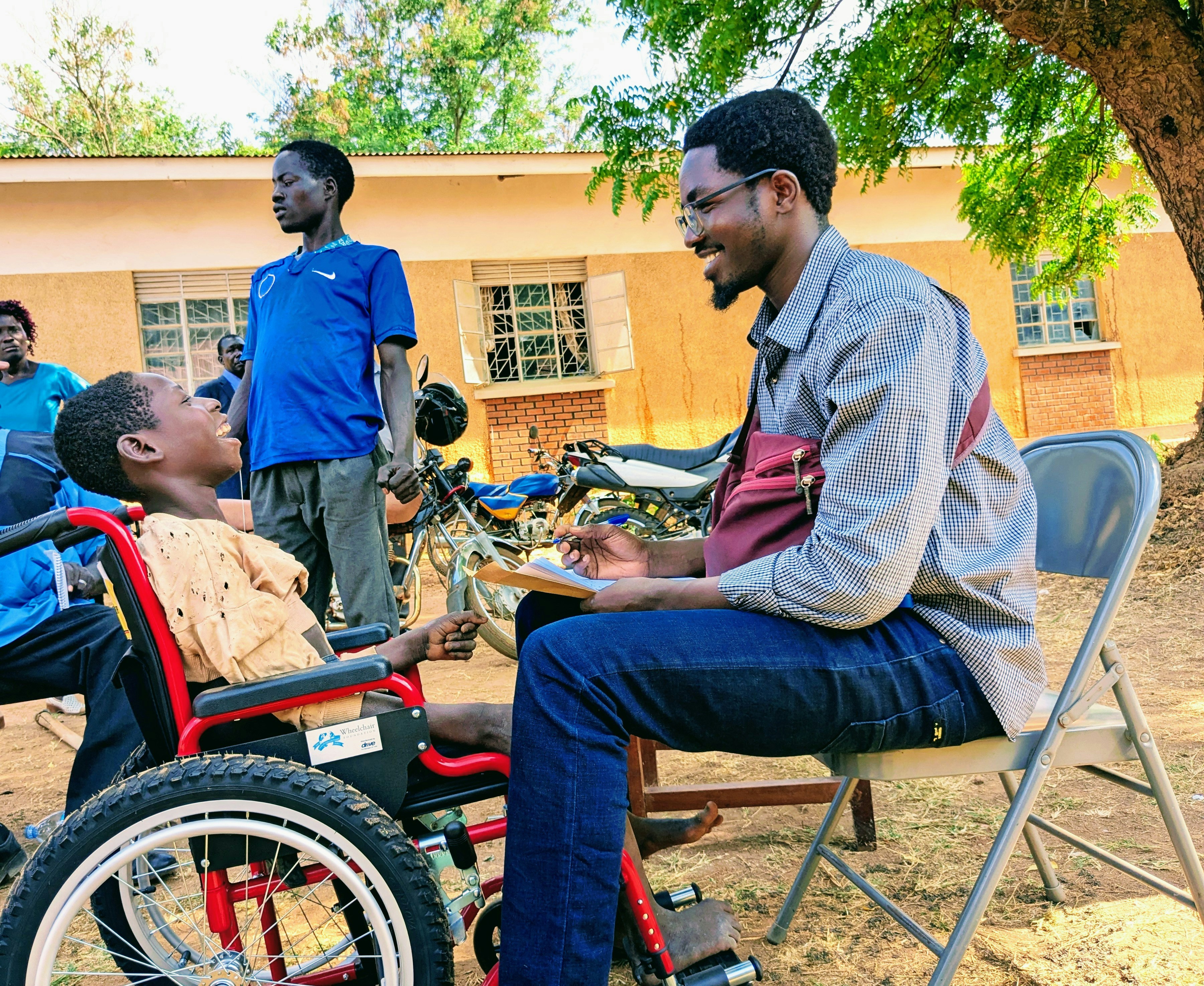 Lift A Child Staff in the field