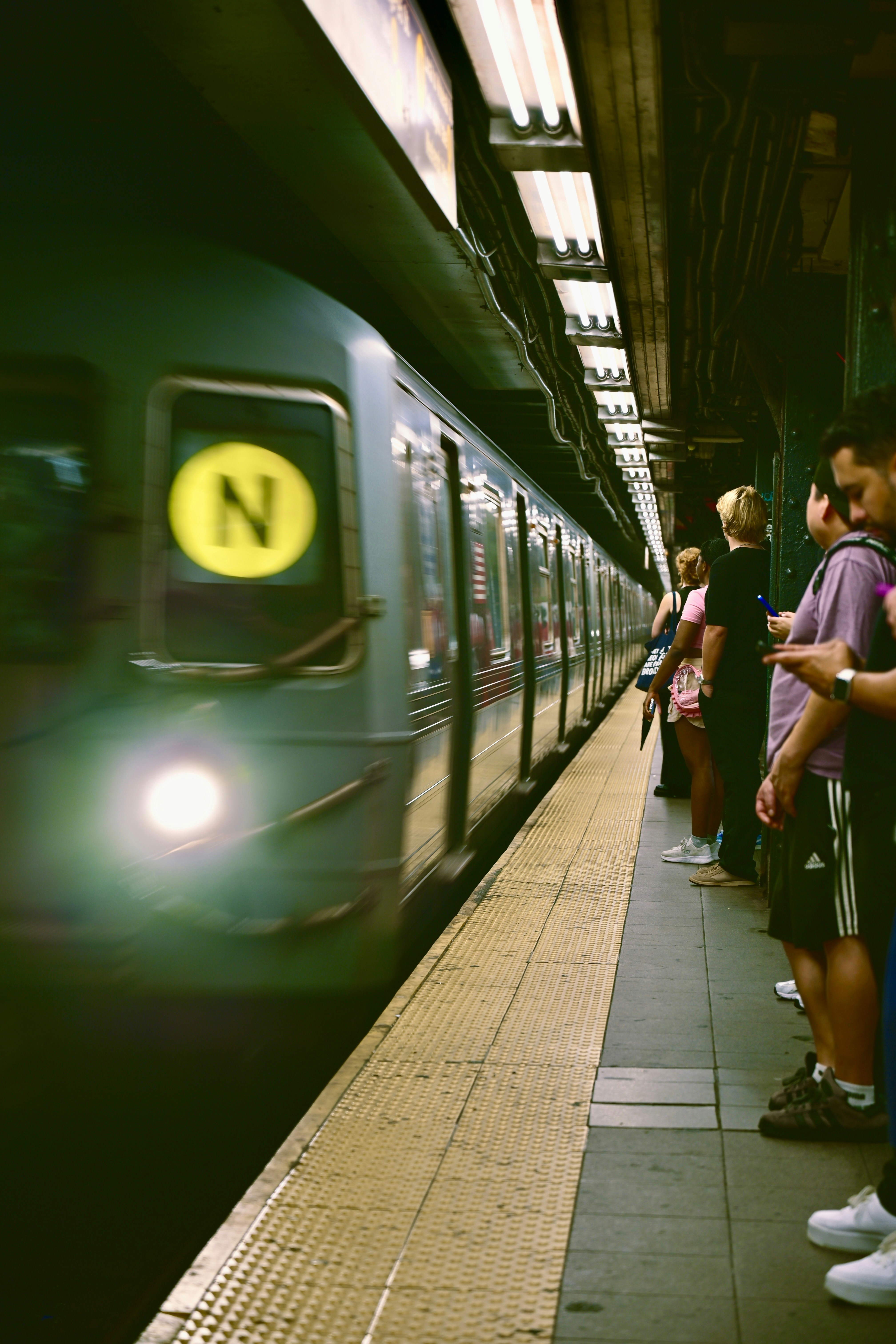 Train arriving at a subway station platform