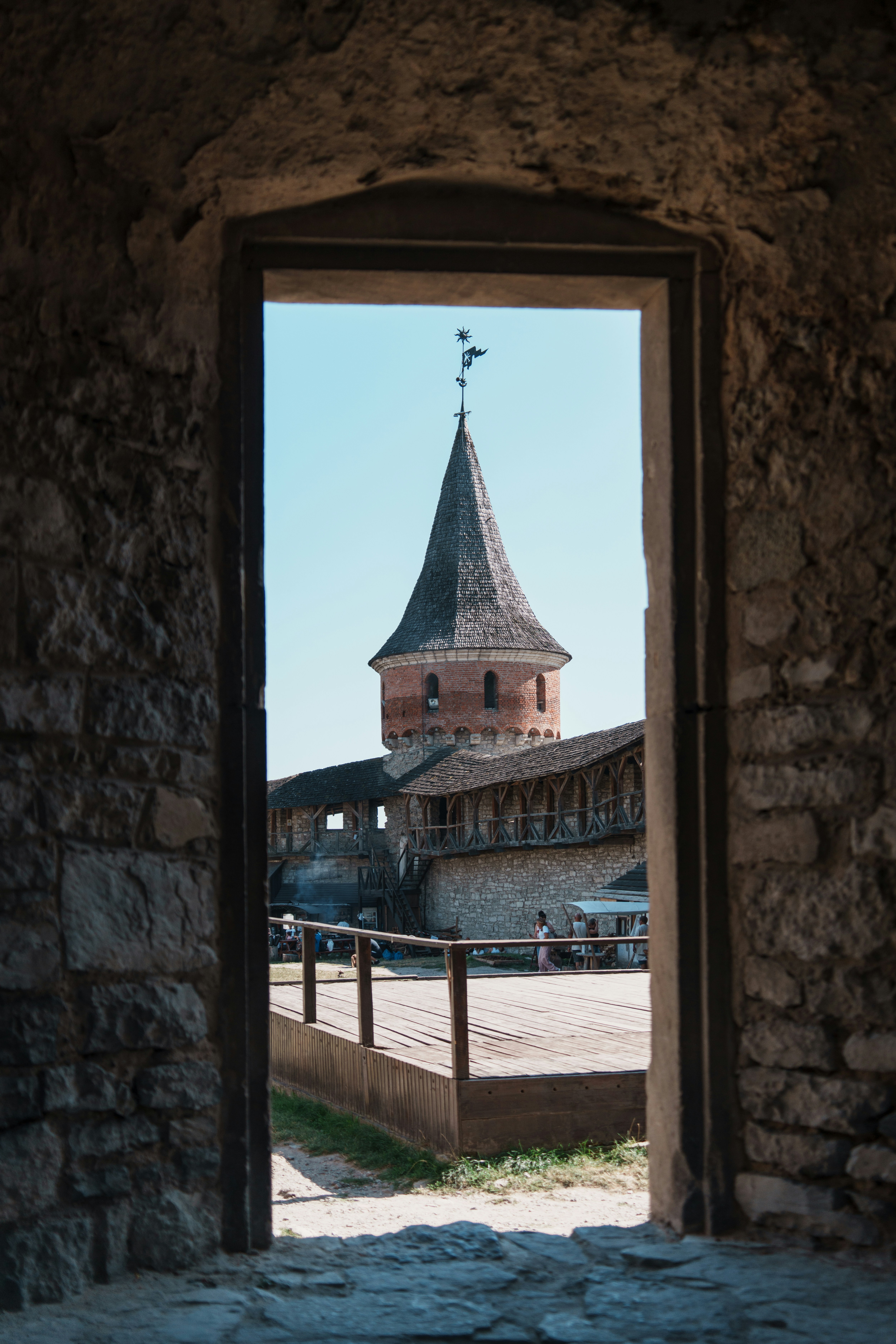 View through stone archway of ancient castle tower
