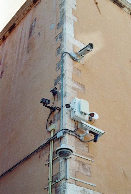 Security cameras mounted on a building corner