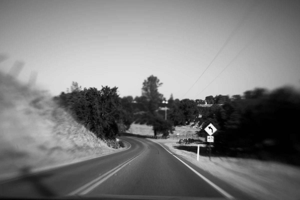 A rural road winding through the Canadian countryside