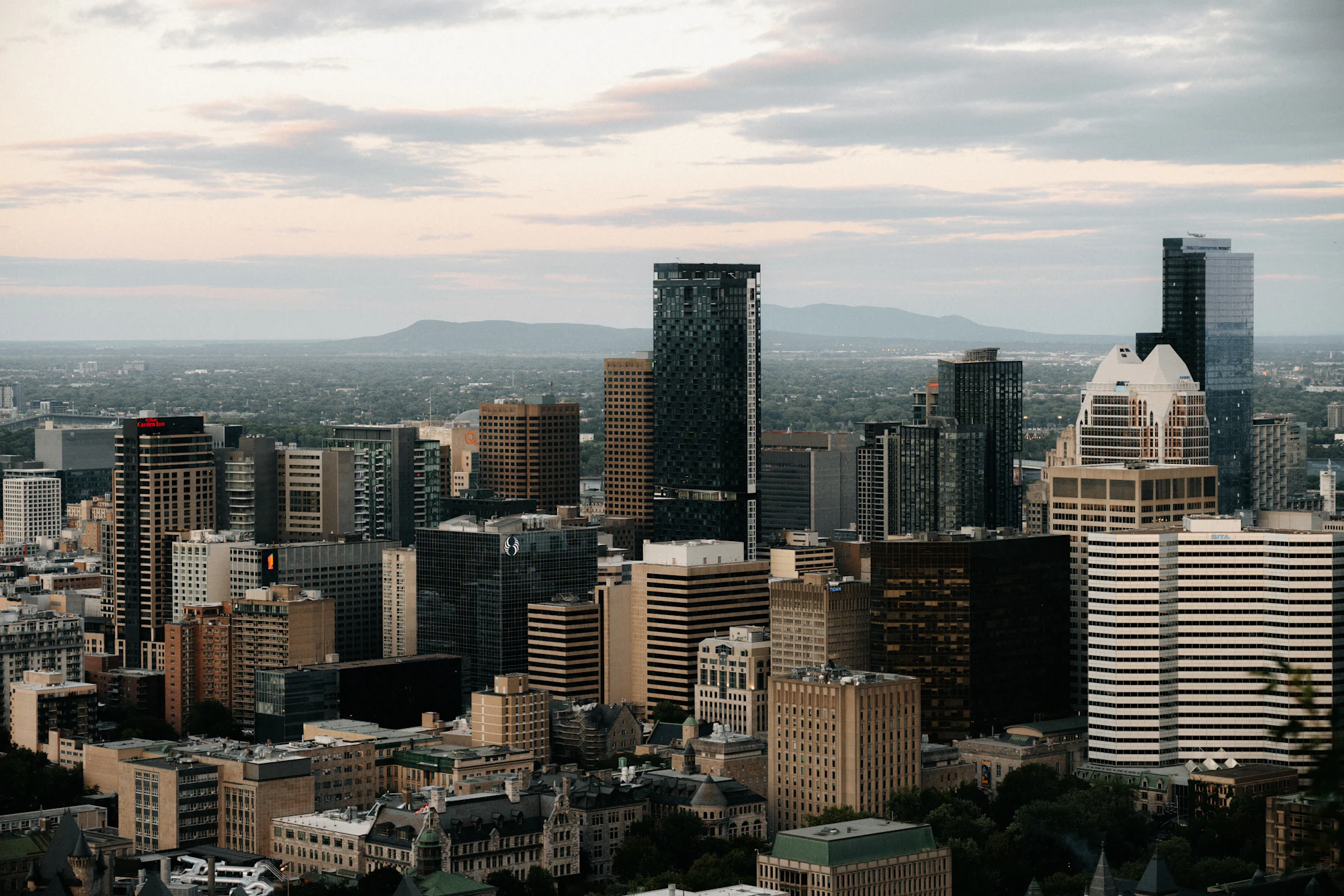 City skyline at dusk representing the financial district