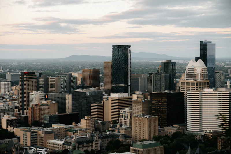 Panoramic view of a financial district skyline at dusk