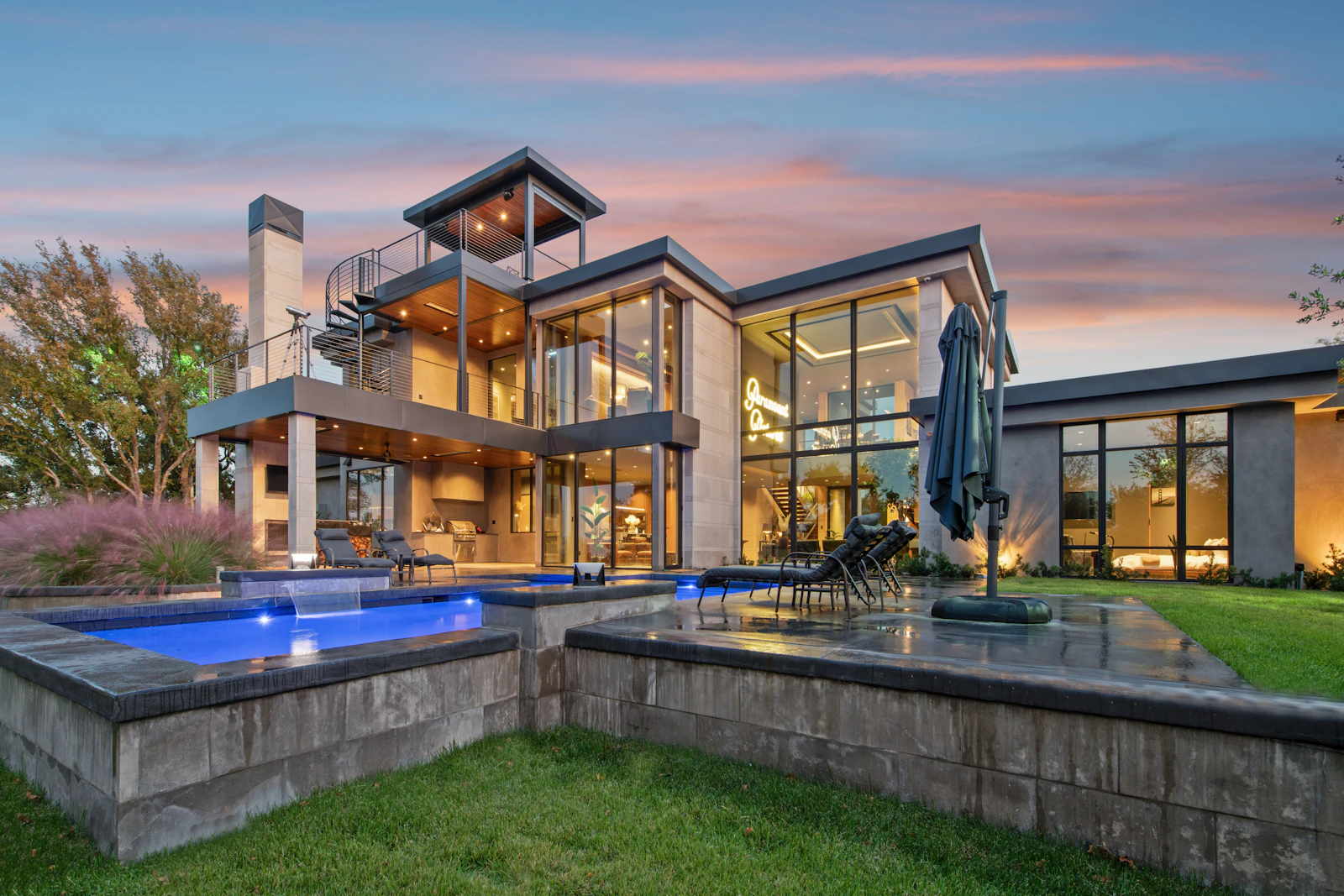 Modern luxury waterfront home at dusk, South Florida