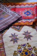 Colorful woven rugs with intricate geometric patterns