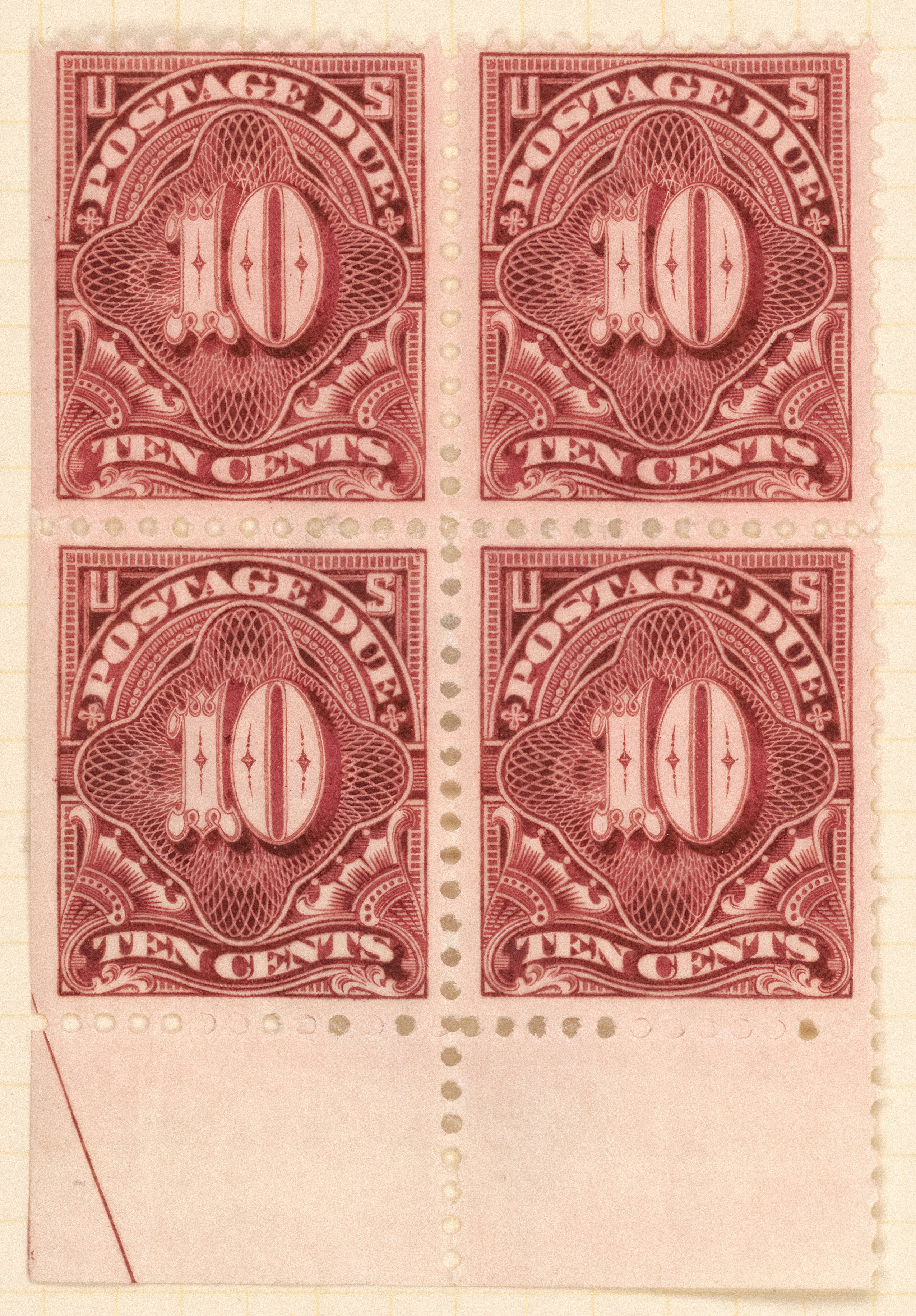 Four maroon postage due stamps with number 10