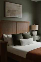 A cozy bedroom with a neatly made bed