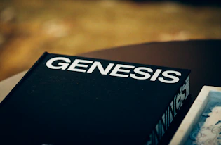 A black book with the word genesis on it.