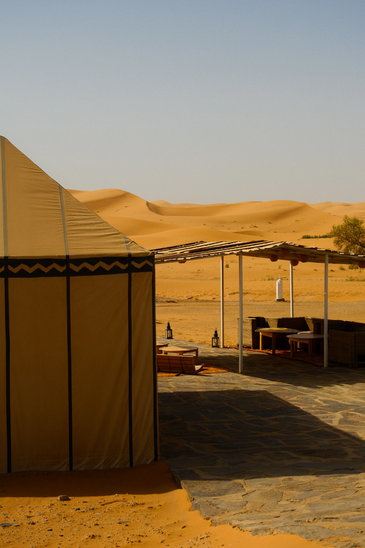 Sahara desert camp with tents among the dunes at Erg Chebbi